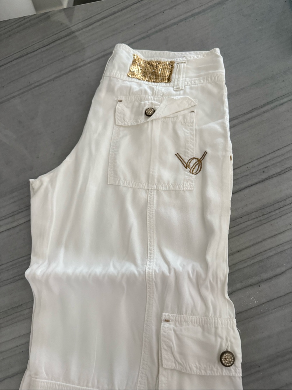 bebe White Cargo style dress pants with Gold Stitching Detail